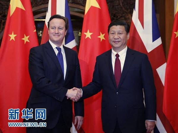 12月2日，國家主席習近平在北京釣魚臺國賓館會見英國首相卡梅倫。 新華社記者 鞠鵬 攝