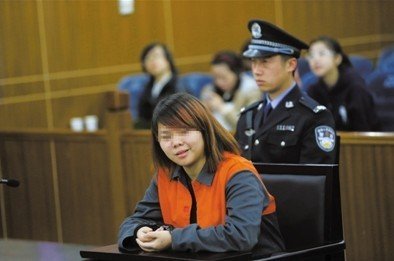 2013年4月3日，被告人小萍在法庭上受審。新京報記者 王貴彬 攝