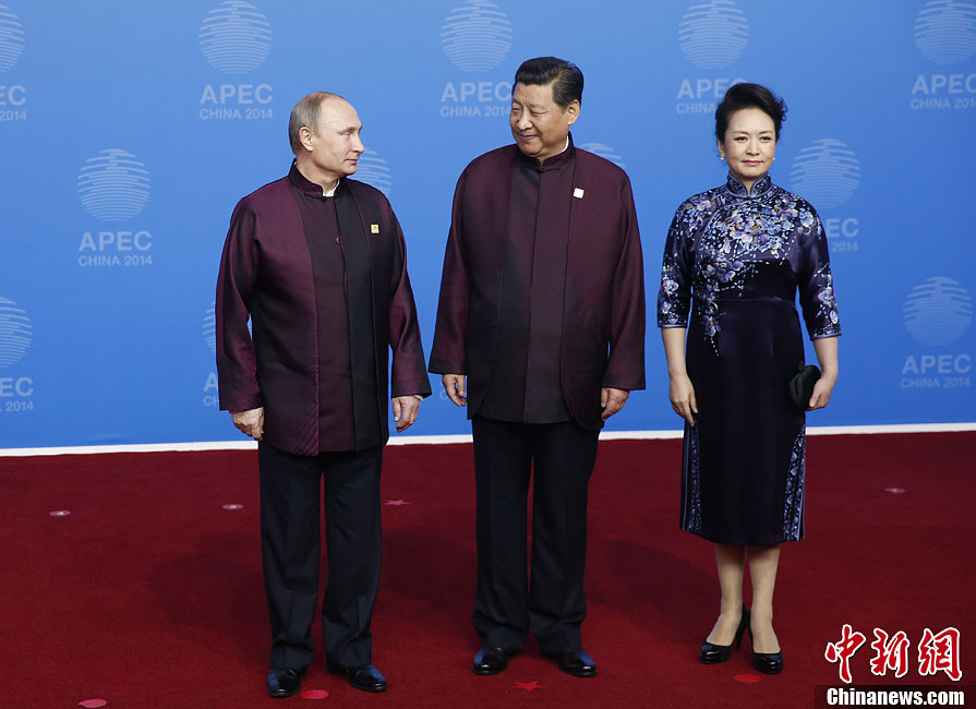 圖為習(xí)近平夫婦歡迎俄羅斯總統(tǒng)普京。中新社發(fā) 杜洋 攝